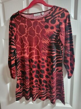 Vibrant Susan Graver top. Has a cool red and black animal print design. XS